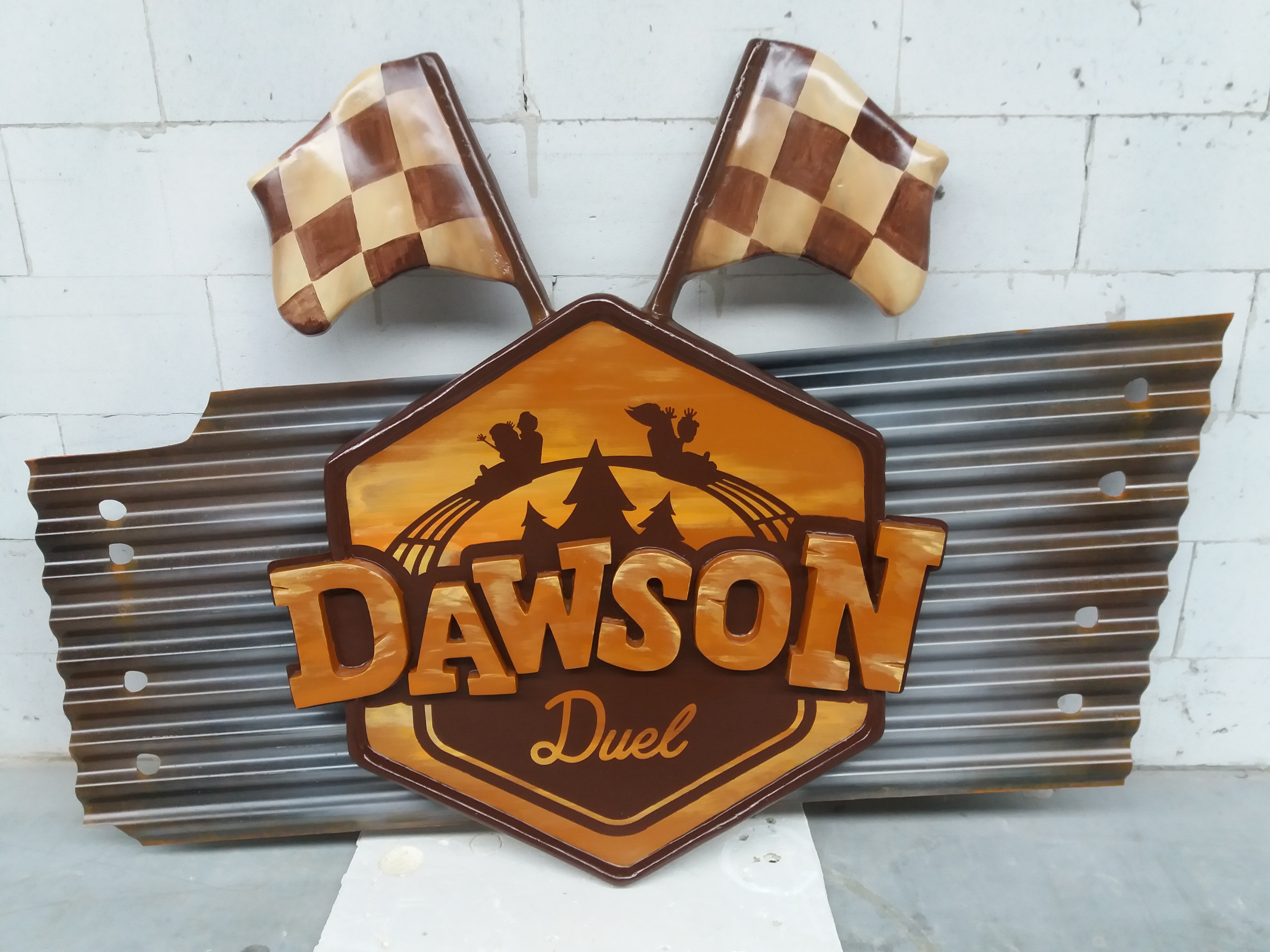 image of dawson duel logo, dawson duel entrance board, 3D logo, logo, sculpture,sculping, prop, propmaker,logo in fiberglass, decor construction, thematization, theming, 