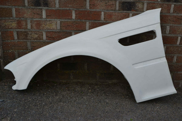 picture of a BMW E46, BMW parts, BMW fiberglass parts, BMW E46 front bumper, BMWE46 rear bumper, BMWE46 motorhood, BMWE46 sideskirt, BMWE46 wheel archer, BMW E46 door, BMW E46 fender, BMW E46 wide body kit, BMW E46 wide body, M3 motorhood, M3 fender